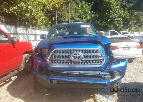 2016 Toyota Tacoma Double Cab z USA, uszkodzony, nr VIN 5TFCZ5ANXGX018193